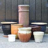 A collection of glazed garden pots