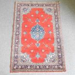 A Persian kashan rug