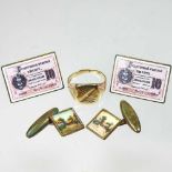 A gold ring and cufflinks