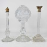 Three various cut glass oil lamps