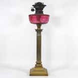 A 19th century brass oil lamp