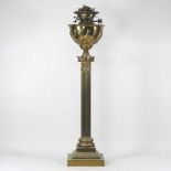 A 19th century brass oil lamp