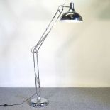 A large chrome floor lamp