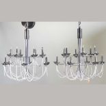 A pair of modern chandeliers