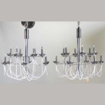A pair of modern chandeliers
