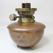 An Arts and Crafts oil lamp with a Benson burner