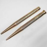 Two 9 carat gold pencils