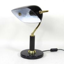 A black glass and marble desk lamp