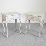 A pair of grey painted side tables