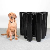 Nine tall black vases