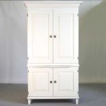 A white painted wardrobe