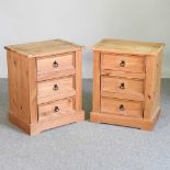 A pair of bedside chests