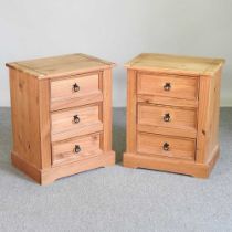 A pair of bedside chests