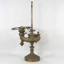 A 19th century brass oil lamp