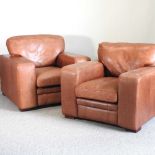 A pair of leather tank chairs
