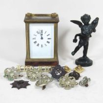 A carriage clock and metalwares