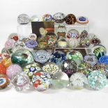 A collection of Murano and other glass paperweights