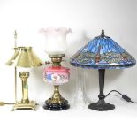 A Tiffany style table lamp and two lamps