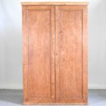 An antique pine cupboard