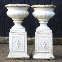 A pair of garden urns