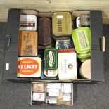 A collection of tobacco tins