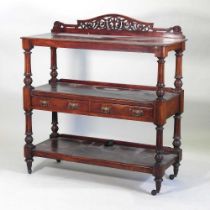 A Victorian mahogany three tier buffet, with a pierced gallery back 120w x 49d x 120h cm