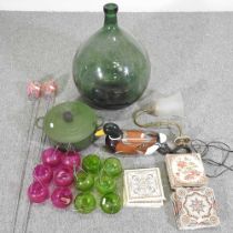 A green glass carboy, together with tea lights, tiles and other items