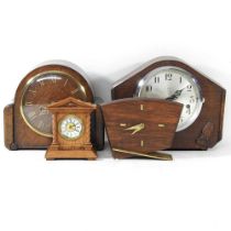 A 1920's oak cased mantel clock, together with three other clocks, highest 22cm (4)