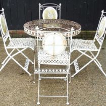 A painted metal folding garden table and four matching chairs (5)