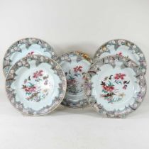 A set of five 18th century Chinese porcelain famille rose dishes, Qianlong period, each painted with