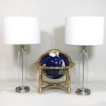 A modern brass and hardstone set terrestrial globe, on a brass stand, together with a pair of