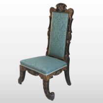 An unusual 19th century papier mache nursing chair, with mother of pearl and gilt decoration,