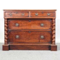 A Victorian mahogany chest of drawers, flanked by spirally turned columns 103w x 50d x 78h cm