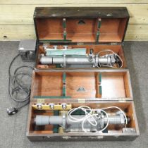 A mid 20th century Hilger & Watts 18 inch auto-collimator, in a fitted wooden case, 53cm wide,
