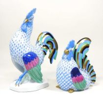 A Herend porcelain model of a cockerel, 23cm high, together with a smaller hen (2) Both appear to be