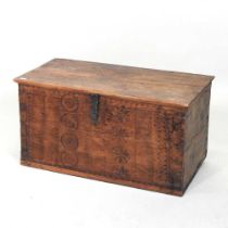 An Eastern carved hardwood trunk, with a hinged lid 66w x33d x 35h cm