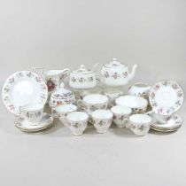 A Minton Spring Bouquet pattern part tea service, together with a Haddon Hall pattern jar and bowl