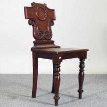 A Victorian mahogany hall chair, on turned legs