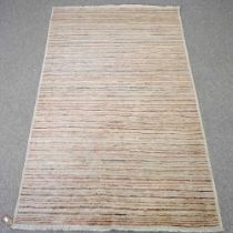 A modern woollen rug, with all over coloured stripes, 205 x 114cm