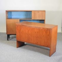 A 1960's teak cabinet, 123cm wide, together with a teak box, with a hinged lid (2)