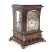 An early 20th century bracket clock, with a four glass case, the eight day movement striking on a