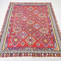 A Persian kilim, with all over coloured diamonds, 230 x 158cm