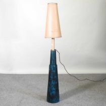 A 1960's glazed pottery table lamp and shade, stamped patent to the base, 34cm high overall Glued at