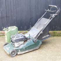A Hayter Harrier 48 petrol lawnmower, together with a green metal jerry can (2)