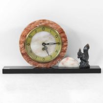 An Art Deco marble mantel clock, surmounted by a bronzed squirrel, on a plinth base, 23cm high