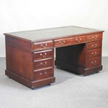 A mid 20th century pedestal desk, with a green inset top, containing nine short drawers 151w x 84d x