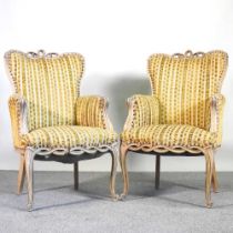 A pair of early 20th century continental upholstered bergere armchairs (2) Overall complete and