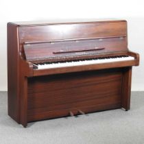 A Welmar teak cased upright piano, 142cm wide 143w x 57d x 111h cm