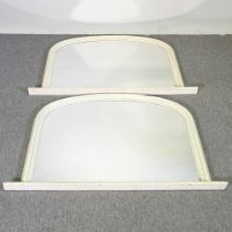 A pair cream painted over mantle mirrors, of arched shape, each 120 x 78cm (2)