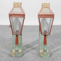 A pair of painted lanterns, 48cm high (2)